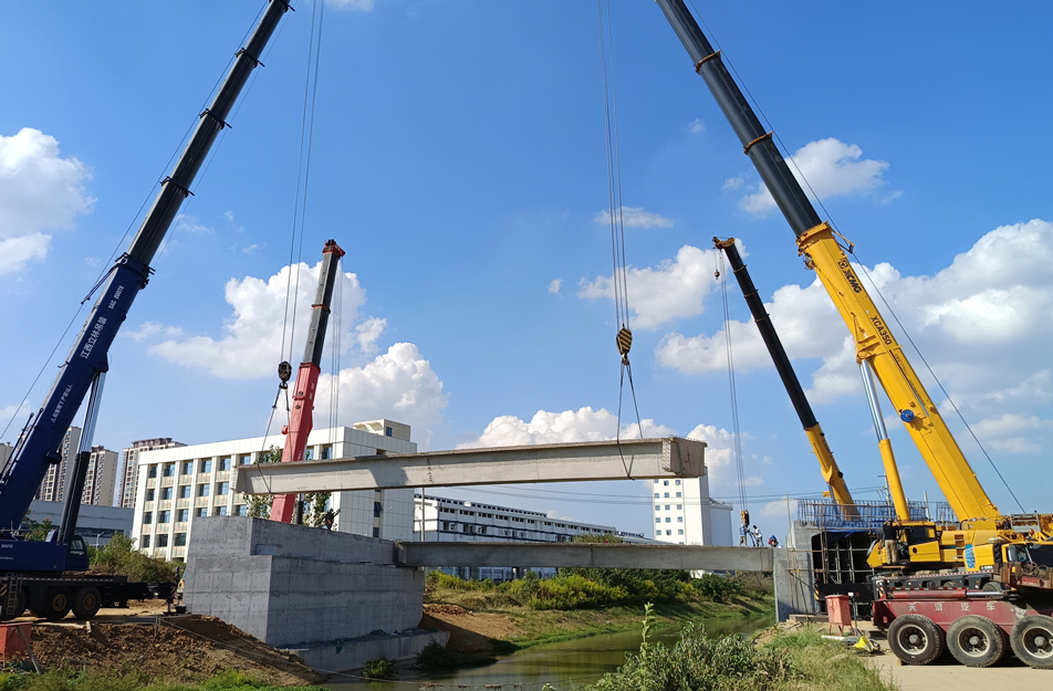 深南互通立交項目完成跨渠橋關鍵梁體吊裝 6片大型箱梁精準安裝 深南互通立交項目完成跨渠橋關鍵梁體吊裝 6片大型箱梁精準安裝